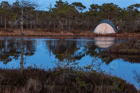 Camping and Tenting by the Lake 15184405 Stock Photo at Vecteezy