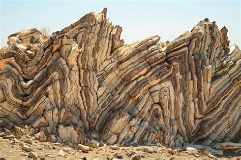 these sedimentary limestone layers were once layered horizontal at the bottom of the sea. They ...