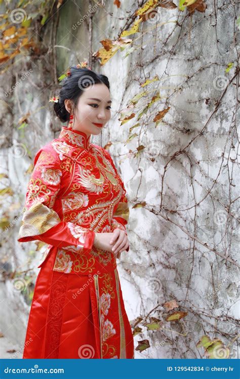 Young, Beautiful and Elegant Chinese Woman Wearing a Typical Chinese ...