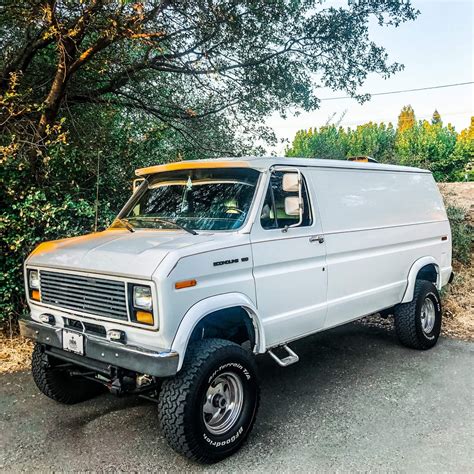 Lifted 1990 Ford E150 Van – Classic Look with a Modern Twist