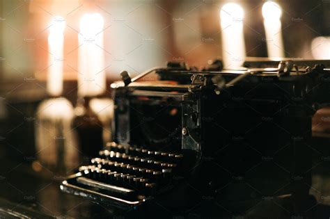 Old typewriter on bokeh background | Abstract Stock Photos ~ Creative Market