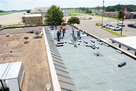 Commercial Flat Roof Installation - J&M Roofing and Construction