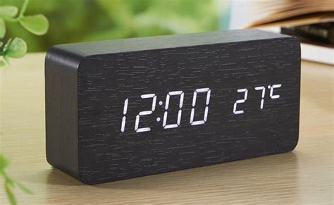 This LED Alarm Clock Is Made Almost Entirely of Black Wood