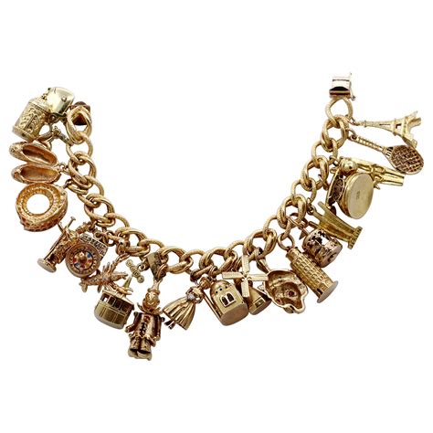 Gold Charm Bracelet with Eleven Charms with Assorted Stones at 1stDibs