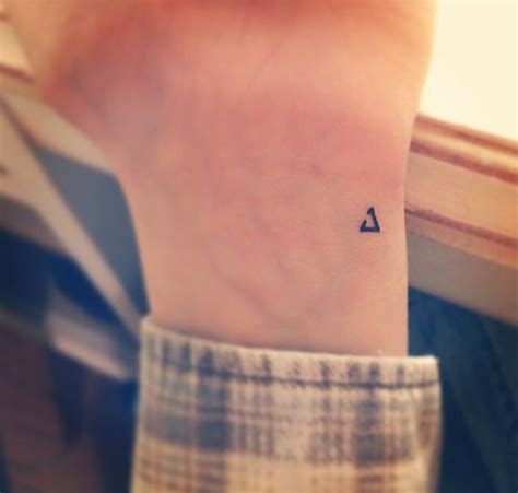 Tiny Delta Wrist Tattoo