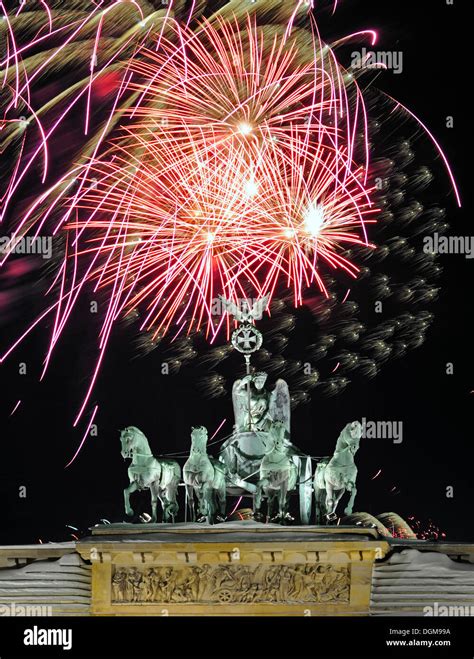 Quadriga on Brandenburg Gate, fireworks on New Years Eve, Berlin, Composing Stock Photo - Alamy