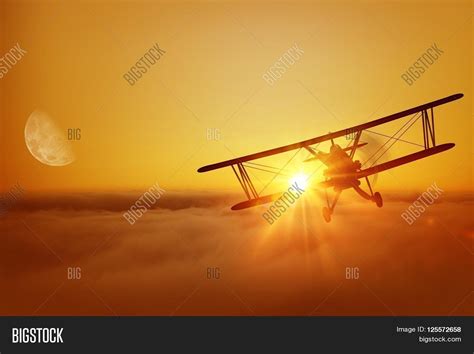 Airplane Above Clouds Image & Photo (Free Trial) | Bigstock