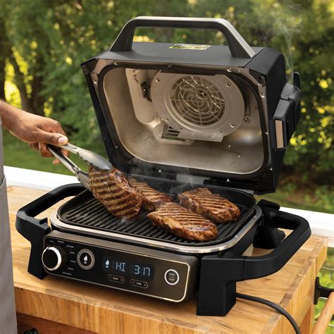 Ninja Woodfire Outdoor Grill & Smoker, 7-in-1 Master Grill, BBQ Smoker, & Outdoor Air Fryer with ...