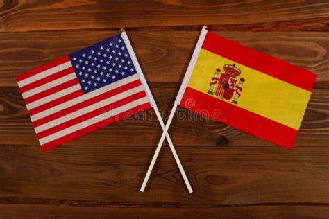 Flag of USA and Flag of Spain Crossed with Each Other. USA Vs Spain ...