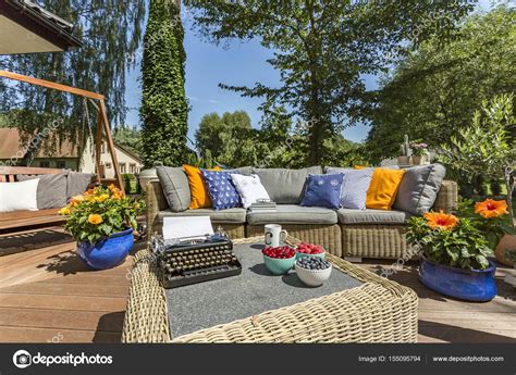 Terrace with garden furniture and typewriter Stock Photo by ©photographee.eu 155095794