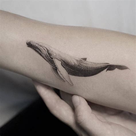 Micro-realistic whale tattoo on the inner forearm. Whale Tail Tattoo, Humpback Whale Tattoo ...