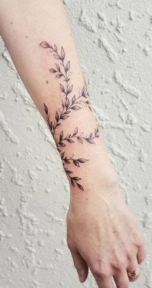 50 Amazing Vine Tattoos | Vine tattoos, Around arm tattoo, Forearm tattoo women