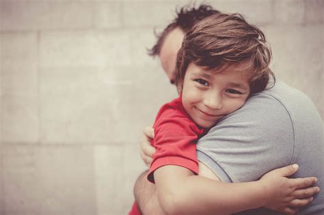 little boy hugging his dad - Morrison Child & Family Services