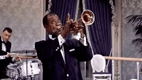 Louis Armstrong GIF - Louis Armstrong Playing Trumpet - Discover & Share GIFs