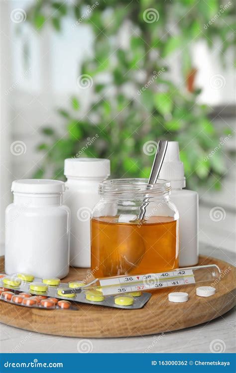 Honey and Different Cold Remedies on White Table Stock Photo - Image of ...