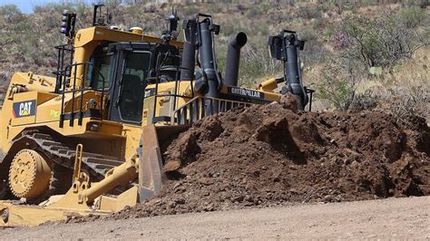 Caterpillar D11 Bulldozer Cutting and pushing Mountain Soil - YouTube