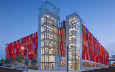 Former New Balance Headquarters Features Accented Rainbow Steel Panels – Lumiflon FEVE Resins