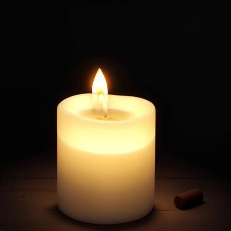 Premium Photo | A glowing candle