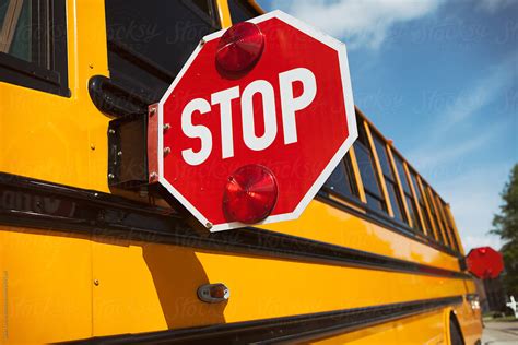 "School Bus: Stop Signs With Lights On Side Of Bus" by Stocksy ...