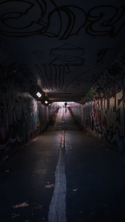 Empty Tunnel With Graffiti on Wall · Free Stock Photo