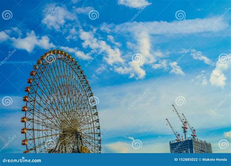 Minato Mirai of the Ferris Wheel and Cosmo Clock Sunset Stock Photo ...