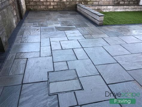 Kendal Grey Limestone Patio with Artificial Grass in Carpenterstown, Dublin - Drivescape Paving