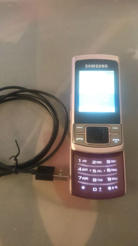 Samsung pink slide up mobile phone | in Warrington, Cheshire | Gumtree