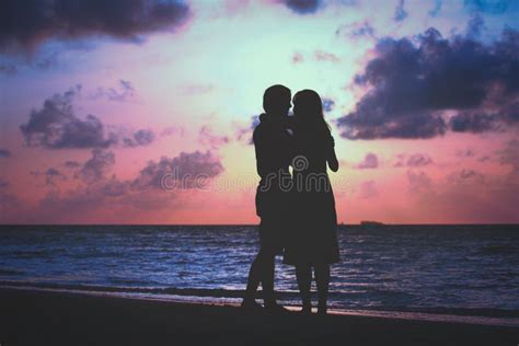 Young Romantic Loving Couple Hug at Sunset Beach Stock Photo - Image of care, happy: 180901576