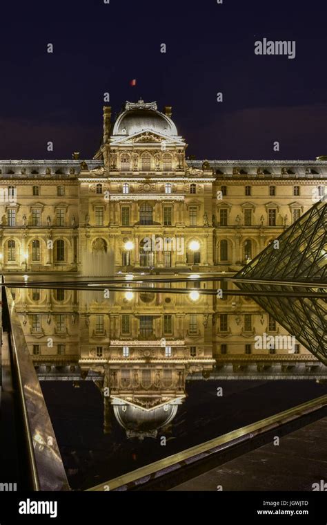 Louvre Museum at night in Paris, France Stock Photo - Alamy