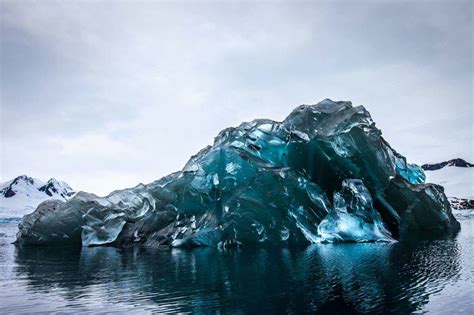 An iceberg that has flipped over in Antarctica : r/interestingasfuck