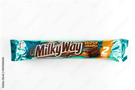 Milky Way milk chocolate bar with salted caramel on white background. Stock Photo | Adobe Stock