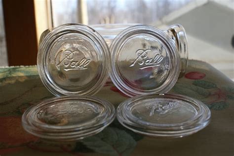 Vintage glass canning jar lids by midsummerdaydream on Etsy