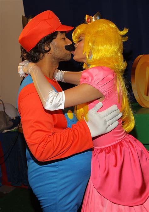 The couple looked too cute in their Mario and Princess Peach costumes | Chrissy Teigen and John ...