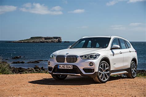 White BMW SUV parked near seashore during daytime HD wallpaper | Wallpaper Flare