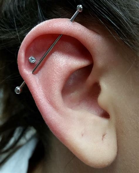 Helix Piercing [50 Ideas]: Pain Level, Healing Time, Cost, Experience - Piercee