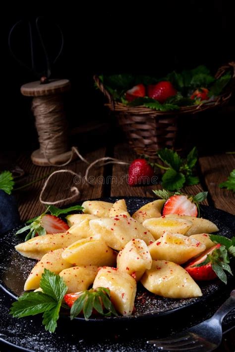 A Kopytka - Polish Potato Dumpling with Strawberries Stock Image - Image of germany, cheese ...