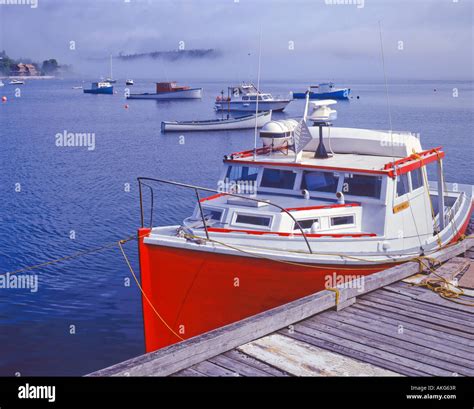 Red and White fishing boat in Fishing Villages on Canada s East Coast Nova Scotia and ...