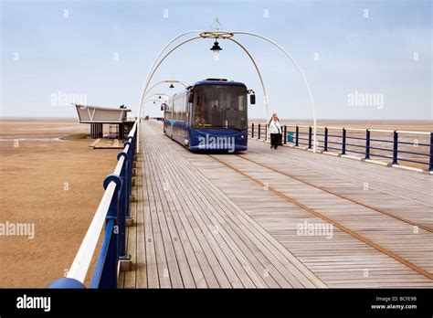 Southport Pier with tram Stock Photo - Alamy