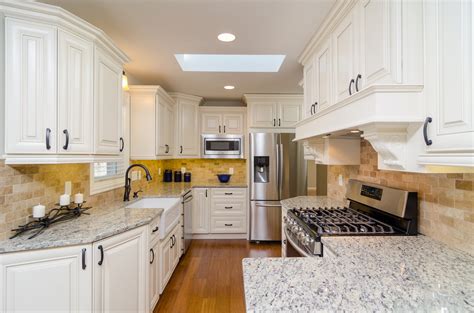 Say "Hi!" to a Classic White Kitchen with Unique Cabinets from GEC