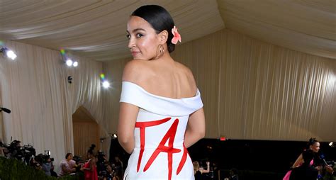 AOC Showed Up At The Met Gala With A Dress That Read 'Tax The Rich'