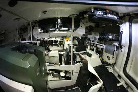 Detail of a M1A1 Abrams interior. Roof armor, Armored shutter and partial TC position. : r/TankPorn