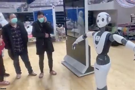 Coronavirus hospital ward staffed by robots opens in Wuhan to protect medics