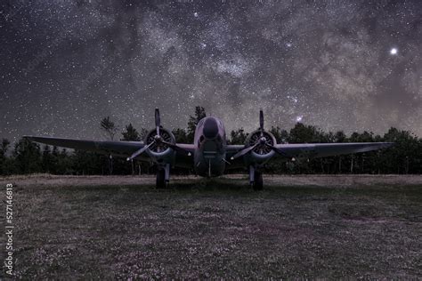 A Lockheed Hudson Bomber rests in an open field under a starry sky at the North Atlantic ...