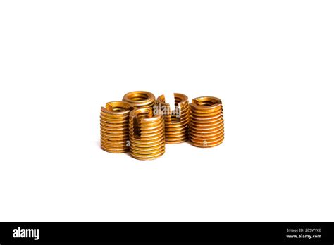 Small copper nuts isolated on white background Stock Photo - Alamy