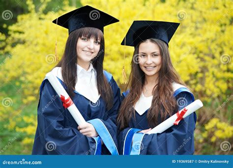 Happy graduation students stock image. Image of diploma - 19369587