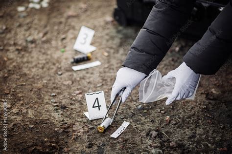 Crime scene investigation - collecting evidence . Stock Photo | Adobe Stock