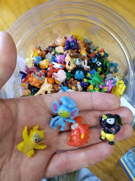 This bin of weird knock off pokemon figures at my local game store : r/mildlyinteresting