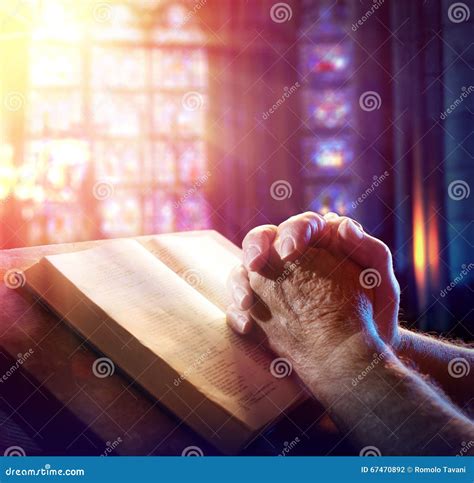 Hands Of A Man Praying Stock Photo - Image: 67470892