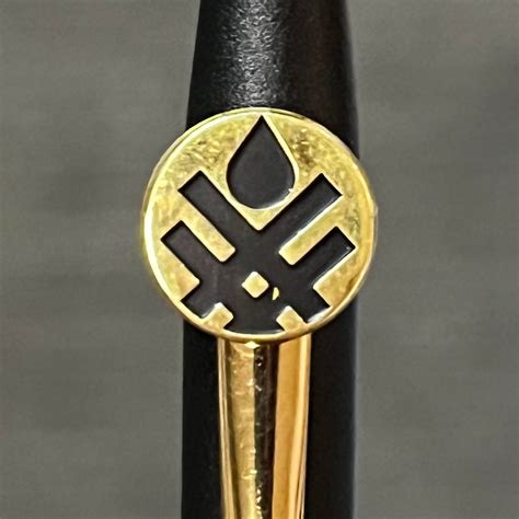 Unidentified logo on cross pen? : r/DoesAnyoneKnow