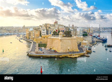 Sunrise at the cruise port and Grand Harbour of Valletta on the Mediterranean island of Malta on ...